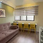 Qi Ibirapuera Intelligence Flat cozinha sala quarto e sacada UH2212